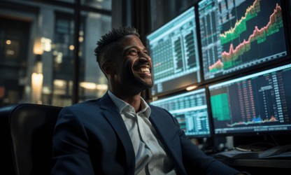 Nigerian forex trader analyzing multiple charts before using Real-Time AI Trading Insights